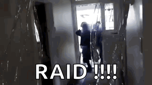 A Person Standing In A Hallway With The Word Raid Written On The Bottom GIF