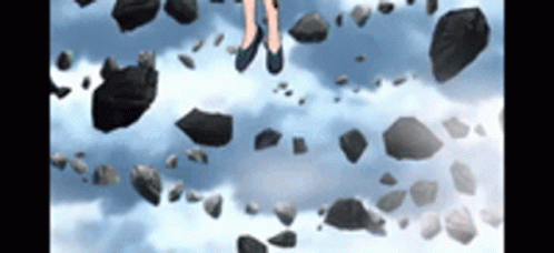 A Person Standing On A Pile Of Rocks In The Sky . GIF