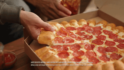 A Person Taking A Slice Of Pepperoni Pizza Out Of A Box GIF