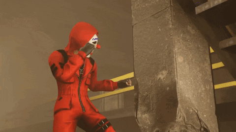 A Person Wearing A Clown Mask And A Red Hoodie GIF