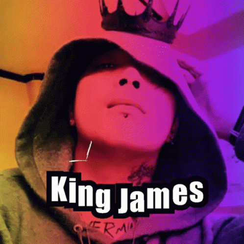 a person wearing a hoodie and a crown with the name king james on the bottom