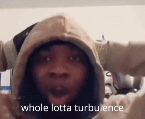 A Person Wearing A Hoodie With The Words Whole Lotta Turbulence On The Bottom GIF
