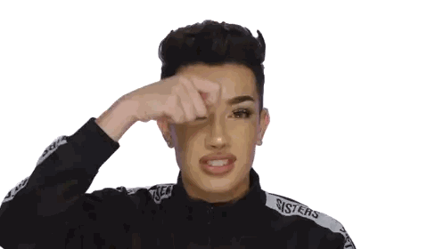 a person wearing a jacket that says sisters on the sleeve
