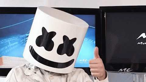 A Person Wearing A Marshmello Hat Gives A Thumbs Up GIF