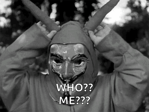 A Person Wearing A Mask And A Hood Says Who Me GIF