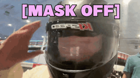 A Person Wearing A Motorcycle Helmet With The Words Mask Off Above It GIF