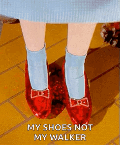 A Person Wearing A Pair Of Red Shoes With A Bow On Them And A Caption That Says `` My Shoes Not My Walker '' . GIF