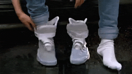A Person Wearing A Pair Of White Shoes And White Socks GIF