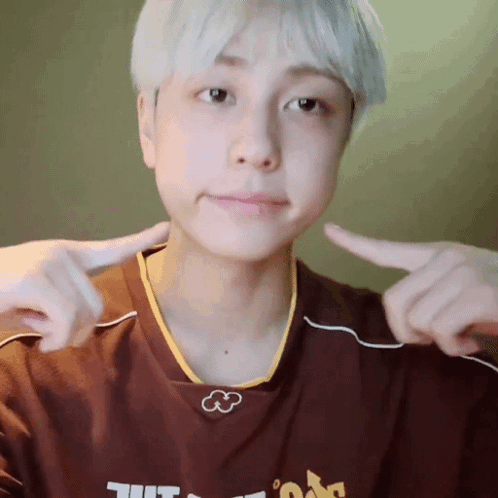 A Person Wearing A Shirt That Says ' Ucsd ' On The Front GIF