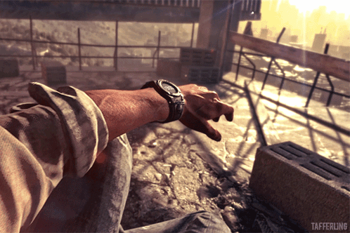 A Person Wearing A Watch With Tafferling Written On The Bottom Right GIF