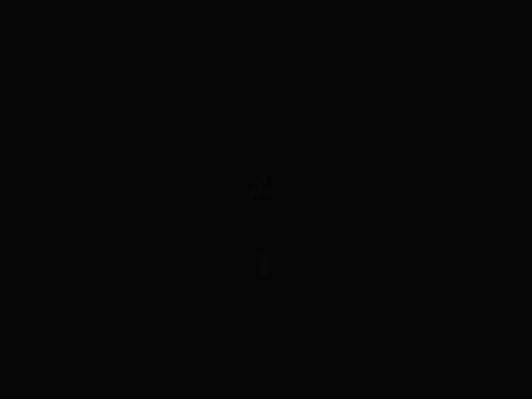 A Person Wearing A Yellow Glove Is Pressing A Button GIF