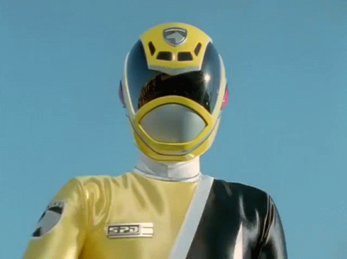 A Person Wearing A Yellow Jacket With The Number 4 On It GIF