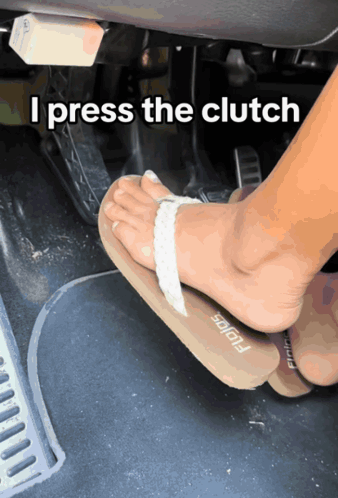 A Person Wearing Flip Flops Pressing The Clutch GIF