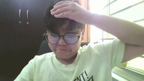 A Person Wearing Glasses And A Shirt That Says " Ent " GIF
