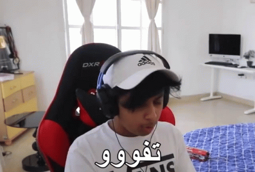 A Person Wearing Headphones And A Hat That Says Adidas On It GIF