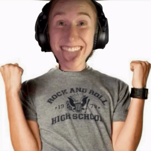 a person wearing headphones and a rock and roll high school t-shirt