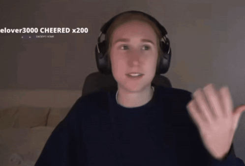a person wearing headphones with the word cheered on the bottom right