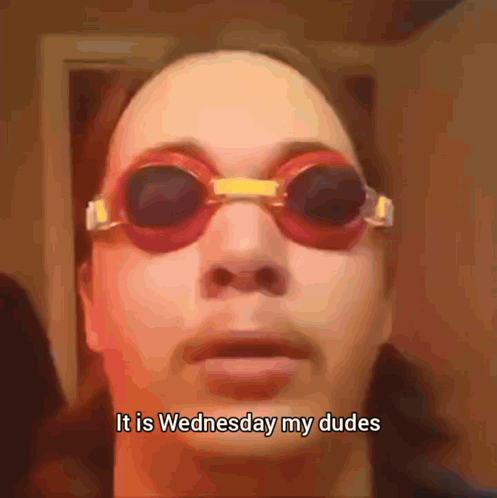 A Person Wearing Swimming Goggles Says It Is Wednesday My Dudes GIF
