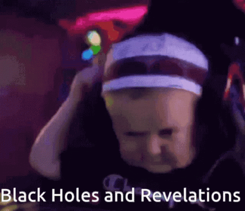 A Person With A Headband On Their Head And The Words Black Holes And Revelations Below Them GIF