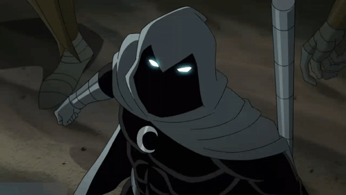 A Person With A Hood And A Crescent Moon On Their Chest GIF