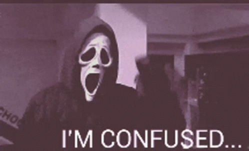 A Person With A Mask On Their Face And The Words I 'M Confused . GIF