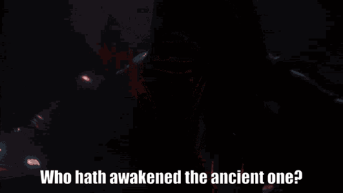A Person With A Red Light Behind Them And The Words " Who Hath Awakened The Ancient One " GIF