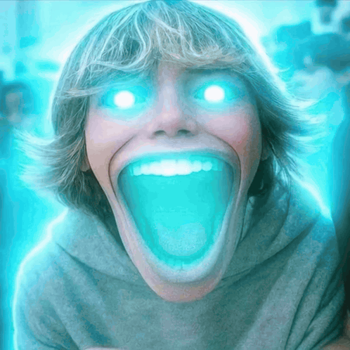 Person With Glowing Blue Eyes And Big Mouth GIF