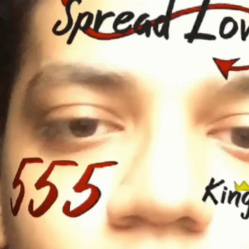 A Person With Spread Love Written On Their Face GIF