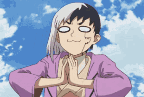 A Person With Their Hands Folded In Front Of Their Face GIF