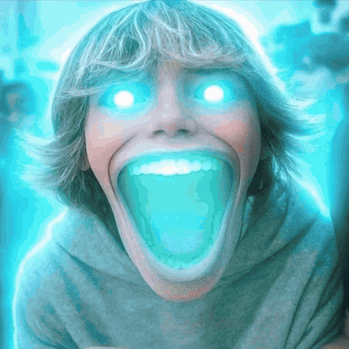 Person With Glowing Eyes And Open Mouth GIF