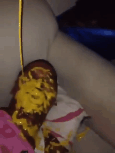 A Person With Yellow Paint On Their Face GIF