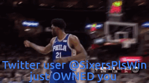 A Philadelphia Basketball Player Is Celebrating A Basket GIF