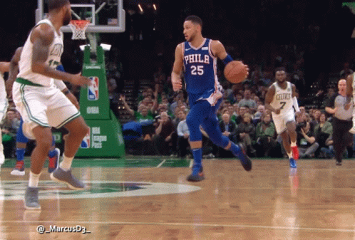 A Philadelphia Basketball Player Is Dribbling A Basketball GIF