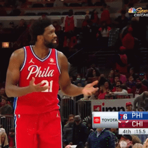 A Philadelphia Basketball Player Stands In Front Of The Crowd GIF