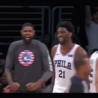 A Philadelphia Basketball Player Wearing A Jersey With The Number 21 On It GIF