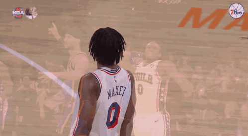 A Philadelphia Basketball Player Wearing Number 0 Celebrates GIF