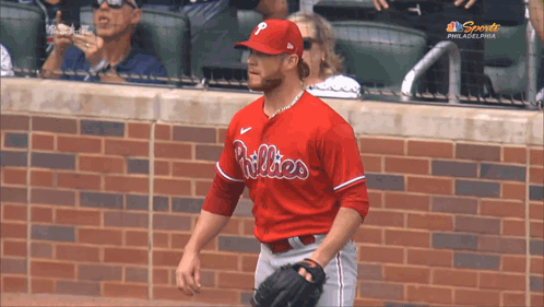 a philadelphia phillies baseball player is standing on the field