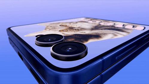 A Phone With A Picture Of A Cat On Its Screen GIF