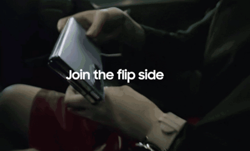 A Phone With A Picture Of A Woman And The Words Unfold Your World On The Screen GIF