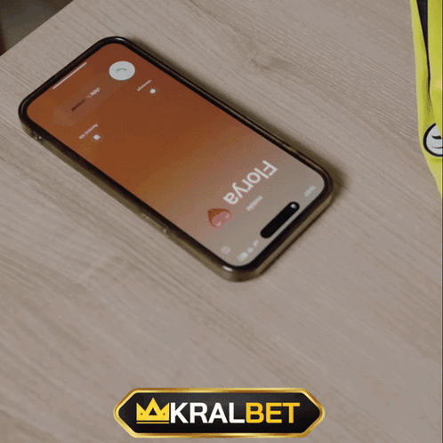 A Phone With A Time Of 19:56 On The Screen GIF