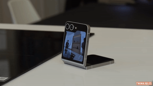 A Phone With The Word Think Jules On The Bottom GIF
