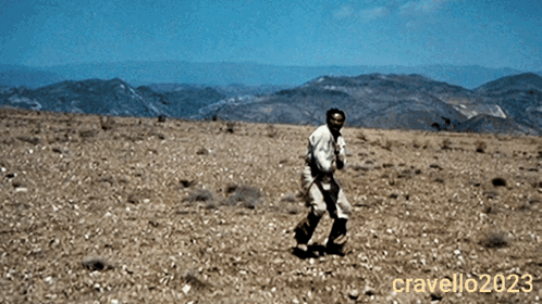 A Photo Of A Man In A Desert Taken By Cravello023 GIF