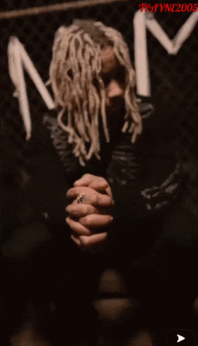 A Photo Of A Man With Dreadlocks Has The Year 2005 On The Bottom GIF