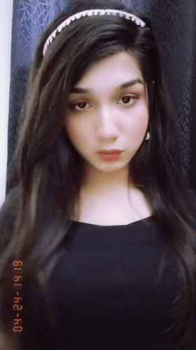 A Photo Of A Woman Taken On January 29Th At 6:40 Pm GIF