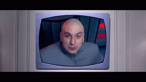 A Picture Of A Bald Man Is Displayed On A Television Screen GIF