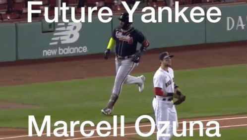 A Picture Of A Baseball Game With The Name Marcel Ozuna On The Bottom GIF
