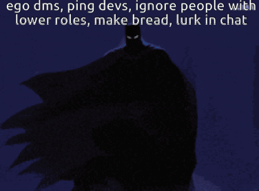 A Picture Of A Batman With The Caption Ego Dms Ping Devs Ignore People With Lower Roles Make Bread GIF
