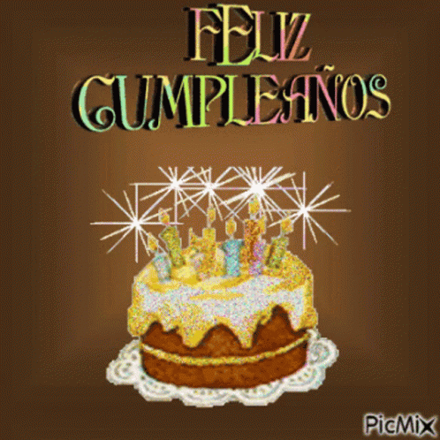 A Picture Of A Birthday Cake With Candles And The Words Feliz Cumpleanos GIF