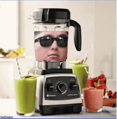 A Picture Of A Blender With A Man 'S Face In It GIF