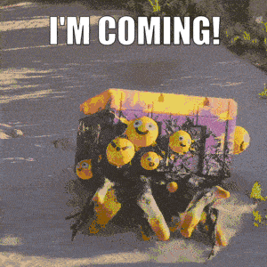 A Picture Of A Box With Smiley Faces On It And The Words " I 'M Coming " GIF